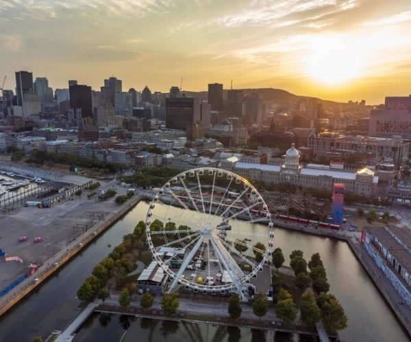 aerial-view-old-port-montreal-downtown-skyline-panorama-summer-dusk-quebec-canada_363815-905