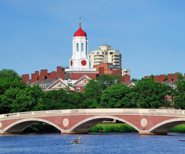 john-w-weeks-bridge-clock-tower-charles-river-harvard-university-campus-boston-with-trees-boat-blue-sky_649448-327